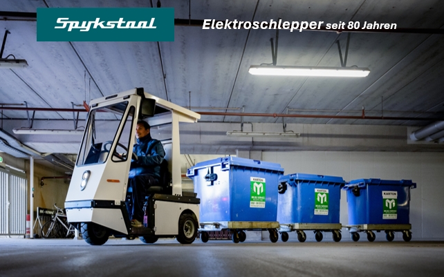 Spijkstaal Elektroschlepper Typ 304 mit Kabine beim Ziehen von Müllcontainern